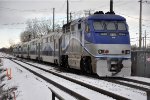 Outbound commuter shoves out of the station